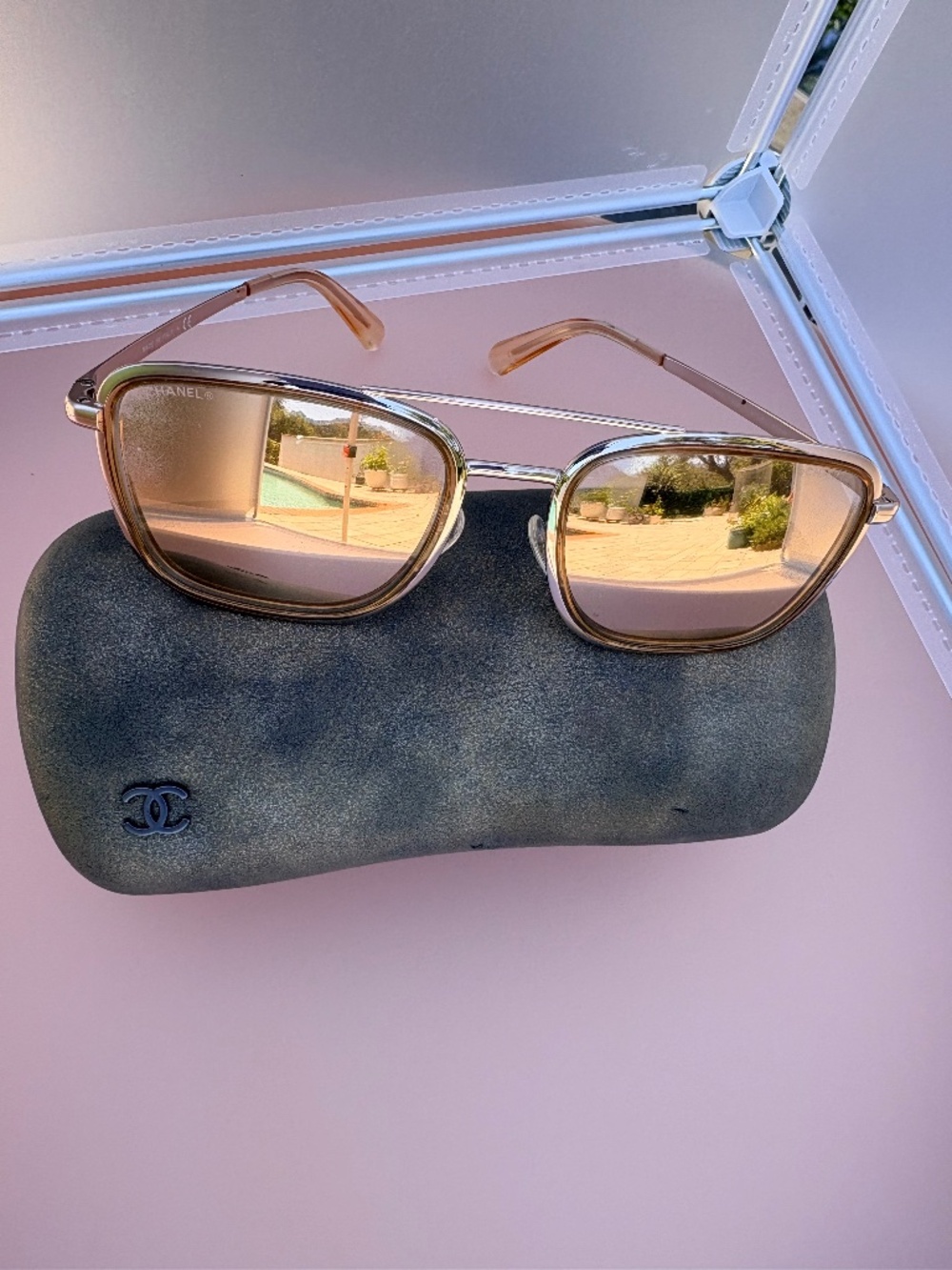 CHANEL 4241 metal pilot sunglasses in gold with mirrored lenses.